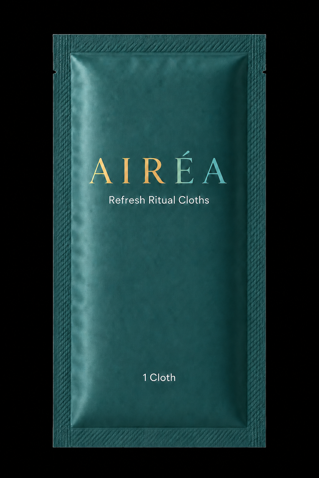 An individually wrapped Airéa refresh cloth on warm sandstone with eucalyptus